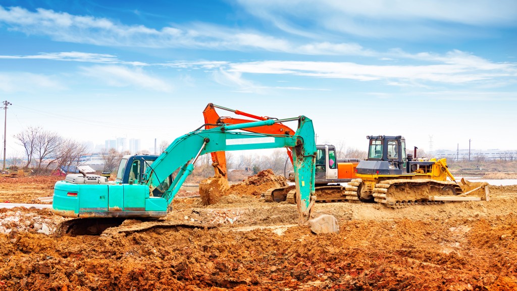 Large excavators and bulldozers at the construction site