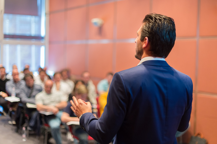 Speaker at Business Conference and Presentation.