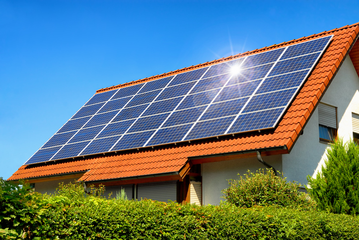 Solar panel on a red roof
